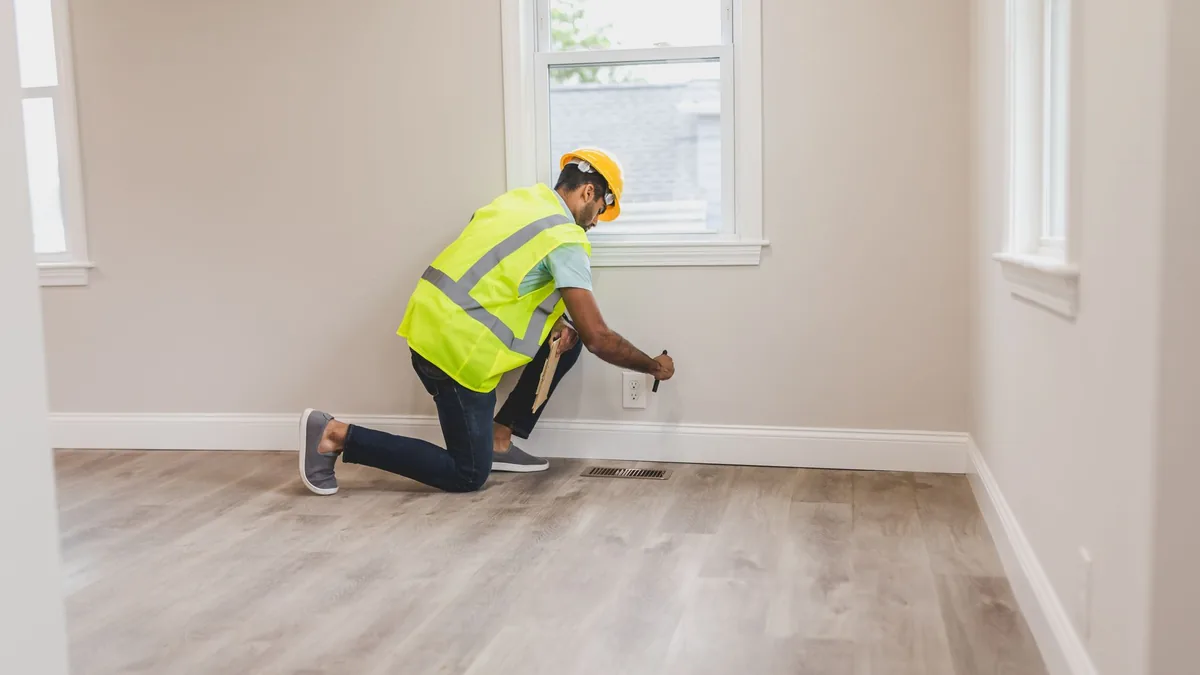 Inspector checking a home's foundation in Baton Rouge, LA
